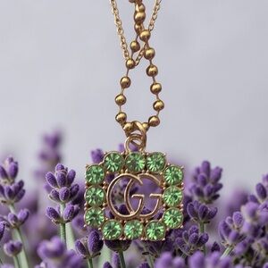 Gucci Gold-Tone up cycled GG Pendant Necklace with Green Crystals